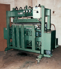Photo of a piano hammer press